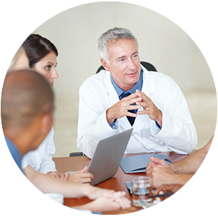 Doctor in discussion with collegues